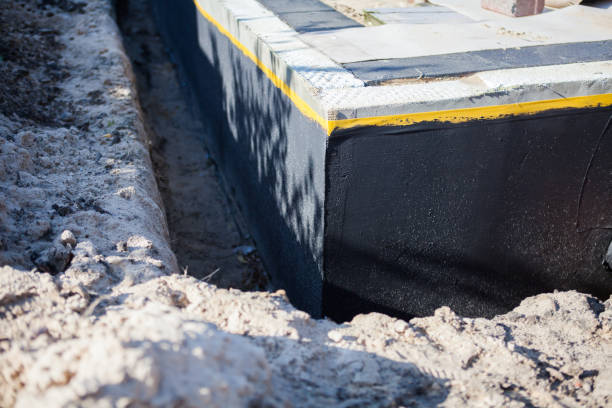 Professional Emergency Waterproofing technician working in Gwynn Oak, MD